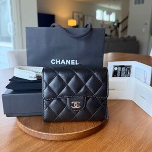Authentic Chanel Compact Flap Wallet in Black Lambskin Silver Hardware